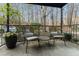 Relax on this outdoor patio with nature views and space for seating at 3529 Essex Ave # 75, Atlanta, GA 30339