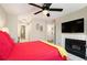 Bedroom featuring a fireplace and mounted television at 3655 Habersham Ne Rd # 226-A, Atlanta, GA 30305