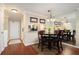 Dining area with hardwood floors, natural light, and a view into the kitchen at 3655 Habersham Ne Rd # 226-A, Atlanta, GA 30305