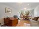 Inviting room with hardwood floors, wainscotting, large window, and a separate sitting area at 3655 Habersham Ne Rd # 226-A, Atlanta, GA 30305