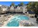 A beautiful pool with plenty of lounge chairs and covered seating areas at 3655 Habersham Ne Rd # 226-A, Atlanta, GA 30305