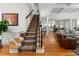 Grand foyer with staircase, hardwood floors, and an open view to the living area at 730 Glenferry Trl, Atlanta, GA 30328
