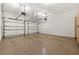 Spacious two-car garage featuring a sealed floor and ample storage, provides secure parking at 730 Glenferry Trl, Atlanta, GA 30328