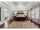 Spacious main bedroom with tray ceiling, lots of natural light, and an en-suite bathroom at 730 Glenferry Trl, Atlanta, GA 30328