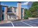 Well-maintained townhome with classic facade and convenient parking at 1115 Riverbend Club Se Dr, Atlanta, GA 30339