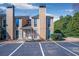 Well-maintained townhome with classic facade and convenient parking at 1115 Riverbend Club Se Dr, Atlanta, GA 30339