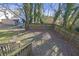 A well-maintained backyard with a wooden fence and wooden staircase at 1146 Sims Sw St, Atlanta, GA 30310