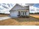 Charming single-story home with stone accents, a two-car garage, and a well-manicured lawn at 121 Sunflower Cir, Cartersville, GA 30121
