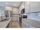 Modern kitchen with granite countertops, stainless steel appliances, and subway tile backsplash at 121 Sunflower Cir, Cartersville, GA 30121