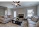 Comfortable living room with a cozy fireplace and plush seating arrangement at 121 Sunflower Cir, Cartersville, GA 30121