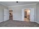 Spacious main bedroom with ensuite bathroom and kitchen access, ideal for modern living at 121 Sunflower Cir, Cartersville, GA 30121