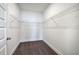 Walk-in closet features wire shelving and neutral carpet, offering ample storage space at 121 Sunflower Cir, Cartersville, GA 30121
