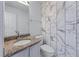 Modern bathroom featuring a granite countertop vanity and designer tile at 475 Cascade Rise Sw Ct, Atlanta, GA 30331