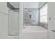 Bathroom showcasing a shower over tub and updated fixtures at 475 Cascade Rise Sw Ct, Atlanta, GA 30331