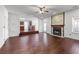Spacious living room with fireplace that opens up to the kitchen and dining room at 475 Cascade Rise Sw Ct, Atlanta, GA 30331