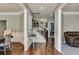 Inviting foyer featuring hardwood floors, white trim, a staircase, and an open view of the home's interior at 730 Pear Grove Pl, Marietta, GA 30066