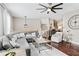 Spacious living area with hardwood floors, a comfortable sectional, and an elegant area rug at 2471 Bridlewood Se Dr # 8, Atlanta, GA 30339
