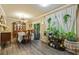 Charming dining room features a hardwood floor, classic chandelier, and an abundance of natural light at 5626 Noblett Sw Rd, Stone Mountain, GA 30087