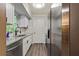 Stylish kitchen with stainless steel appliances, ample counter space, and a bright window for natural light at 5626 Noblett Sw Rd, Stone Mountain, GA 30087