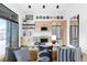 Well-lit kitchen featuring modern appliances, cabinetry, and stylish decor next to the living area at 567 Ponce De Leon Ne Ave # 415, Atlanta, GA 30308