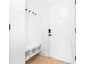 Functional mudroom with built-in bench, storage cubbies, and modern finishes at 567 Ponce De Leon Ne Ave # 415, Atlanta, GA 30308