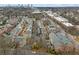 Aerial shot of a neighborhood showcasing tree lined streets and well maintained properties at 1477 Village Park Ne Ct, Atlanta, GA 30319