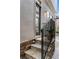 Charming entryway with stone steps and black railings leading to the front door at 1477 Village Park Ne Ct, Atlanta, GA 30319