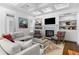 Cozy living room with fireplace, built-in shelves, and neutral color palette at 1477 Village Park Ne Ct, Atlanta, GA 30319