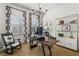 Bright home office with modern desk, shelving, and natural light at 1477 Village Park Ne Ct, Atlanta, GA 30319