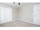Neutral bedroom with closet and door at 1722 Johnston Nw Trl, Kennesaw, GA 30152