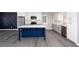 Modern kitchen featuring stainless steel appliances and a large center island at 1722 Johnston Nw Trl, Kennesaw, GA 30152