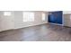 Large, open-concept living area with modern flooring and stylish design at 1722 Johnston Nw Trl, Kennesaw, GA 30152