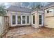 Rear exterior showing a patio and backyard entry at 1815 Monroe Ne Dr, Atlanta, GA 30324