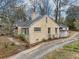 View of the home's exterior showing the front of the home and the driveway at 1815 Monroe Ne Dr, Atlanta, GA 30324