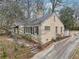 View of the home's exterior showing the front of the home and the driveway at 1815 Monroe Ne Dr, Atlanta, GA 30324