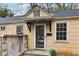 Charming home exterior with an antiquated entryway and dormer at 1815 Monroe Ne Dr, Atlanta, GA 30324