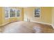 Open living room with hardwood floors and an abundance of natural light at 1815 Monroe Ne Dr, Atlanta, GA 30324