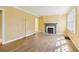 Inviting living room with classic fireplace and hardwood floors with plenty of natural light at 1815 Monroe Ne Dr, Atlanta, GA 30324