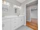 Bathroom featuring double vanity and access to the walk-in closet at 3175 Tackett Rd, Douglasville, GA 30135