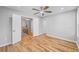 Bedroom with hardwood floors with views to the stairway at 3175 Tackett Rd, Douglasville, GA 30135