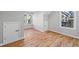 This bedroom features two windows, hardwood flooring, and a grey paint scheme at 3175 Tackett Rd, Douglasville, GA 30135