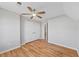 Bedroom with hardwood floors, a ceiling fan, and a closet at 3175 Tackett Rd, Douglasville, GA 30135