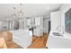 Contemporary kitchen featuring white cabinets, stainless steel appliances, and an island at 3175 Tackett Rd, Douglasville, GA 30135