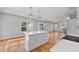 Bright kitchen with white cabinets, stainless steel appliances, and natural light at 3175 Tackett Rd, Douglasville, GA 30135