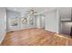 Bright living room with hardwood floors, large windows, and a view of the front yard at 3175 Tackett Rd, Douglasville, GA 30135