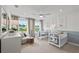 Charming Bedroom with two cribs, a comfy chair, soft colors, and lots of natural light at 628 Topsail Drive Pkwy, Villa Rica, GA 30180