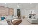 Inviting living room featuring a large sofa, stylish decor, and ample space for Gathering time at 628 Topsail Drive Pkwy, Villa Rica, GA 30180