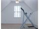 Finished attic space with exercise equipment and ceiling fan at 2003 Hubbard Ct, Villa Rica, GA 30180