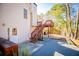 Side view of a home, shows steps, stairs to a deck, patio, and back door at 2003 Hubbard Ct, Villa Rica, GA 30180