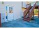 Exterior view shows a back door with steps and a staircase leading to a deck at 2003 Hubbard Ct, Villa Rica, GA 30180